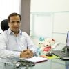 Dr Atish Laddad
