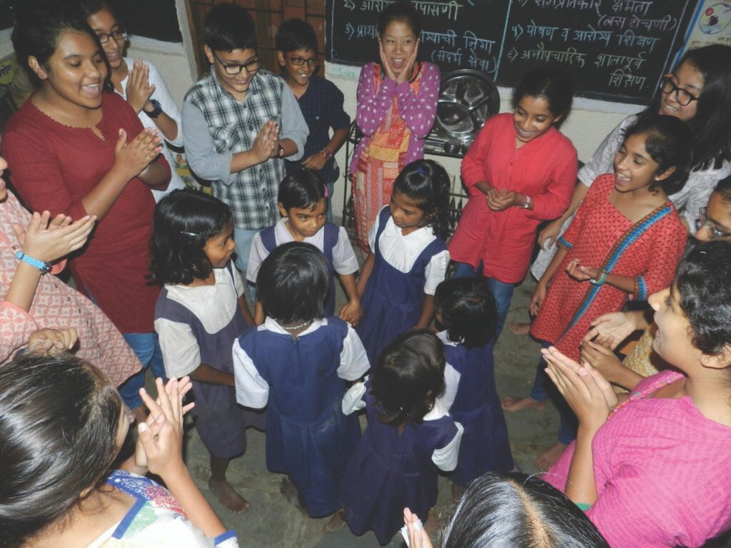 Rishi Valley students with government school children: