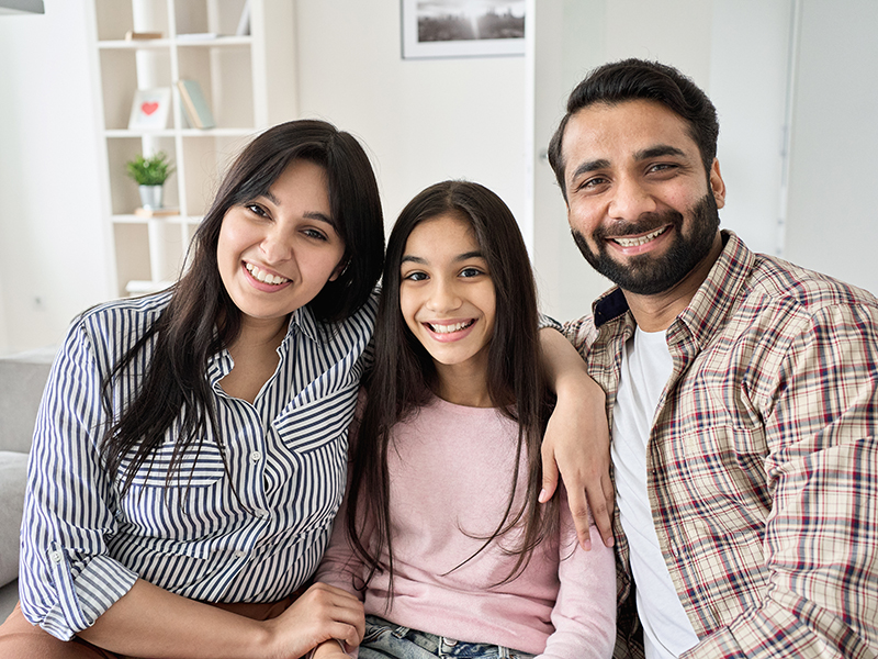 Happy,Indian,Family,Couple,And,Teen,Child,Daughter,Bonding,,Hugging