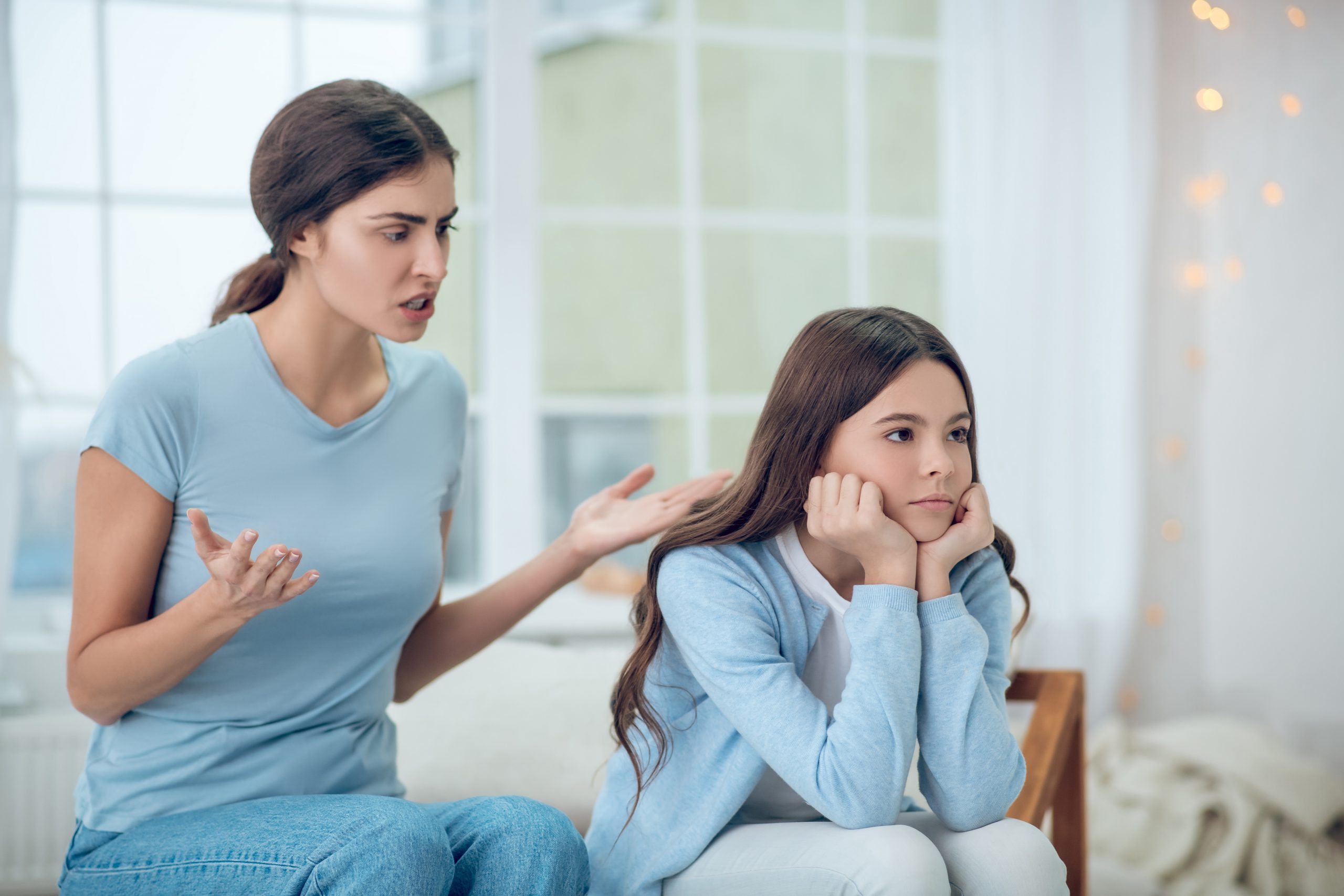 Gesturing,Angry,Mom,And,Misunderstanding,Turned,Away,Daughter