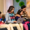 Indian,Family,Busy,Using,Digital,Devices,At,Home,During,Holidays