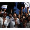 Protestors outside Dharmendra Pradhan's residence