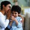 Young,Indian,Woman,Telling,Secret,Whispering,To,Interested,Little,Cute
