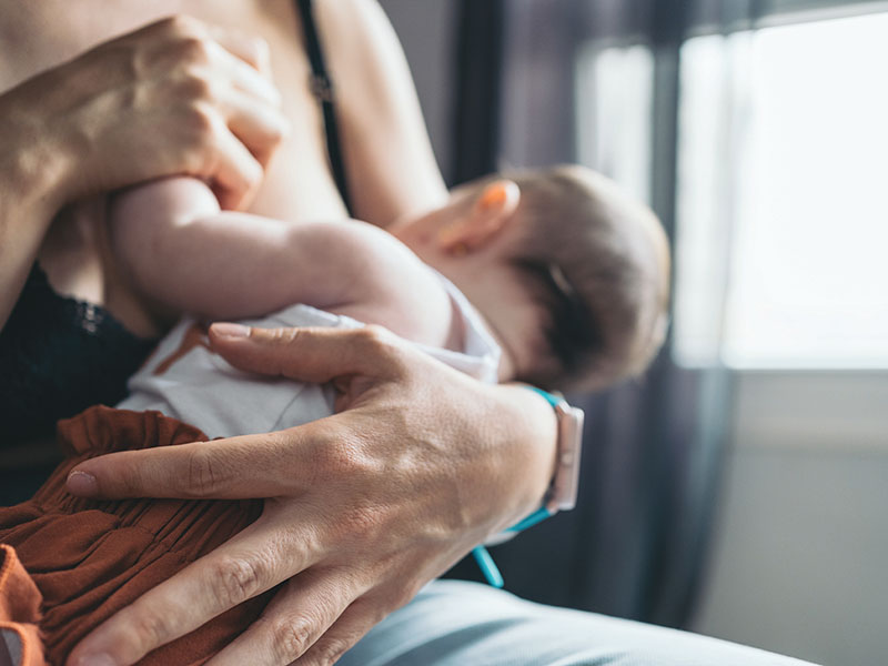 Mother,Is,Providing,Her,Baby,With,Breast,Milk,In,A